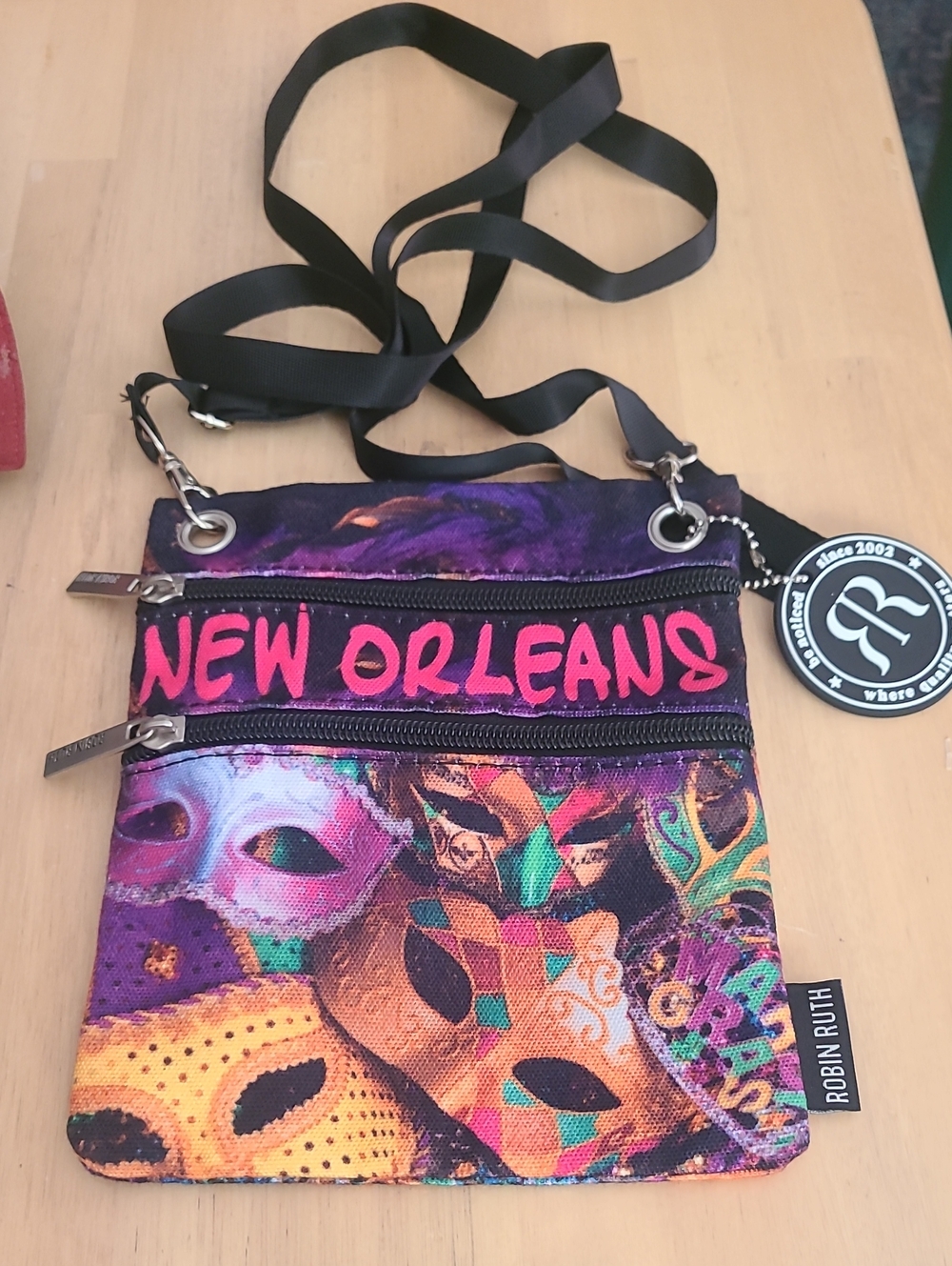 Robin Ruth Purple and Pink New Orleans Mask Crossbody Bag